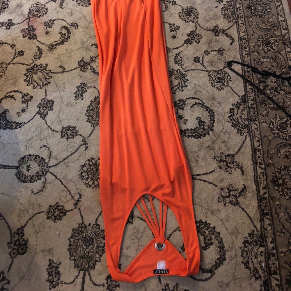 Never worn, long form fitting dress